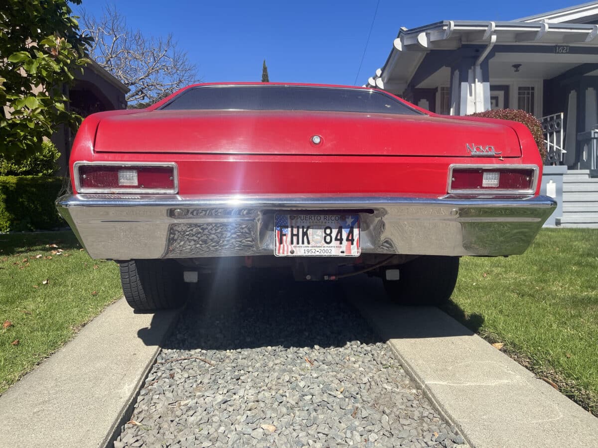 Alameda Post - A Puerto Rico license plate on a red car. 