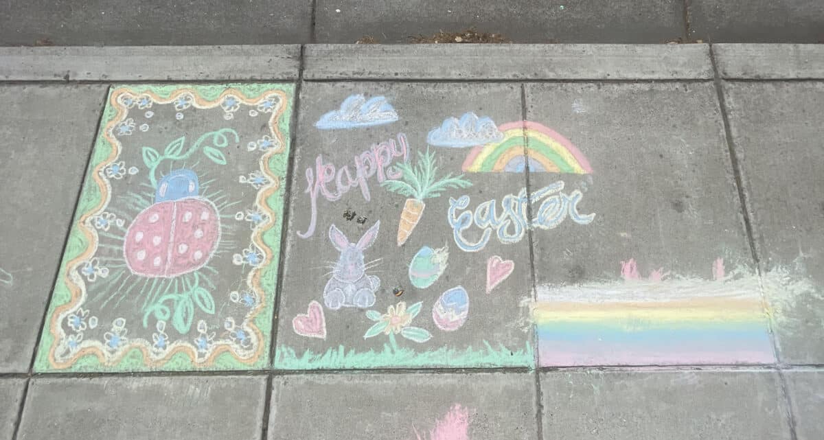 Alameda Post - Colorful sidewalk chalk that says 'Happy Easter"