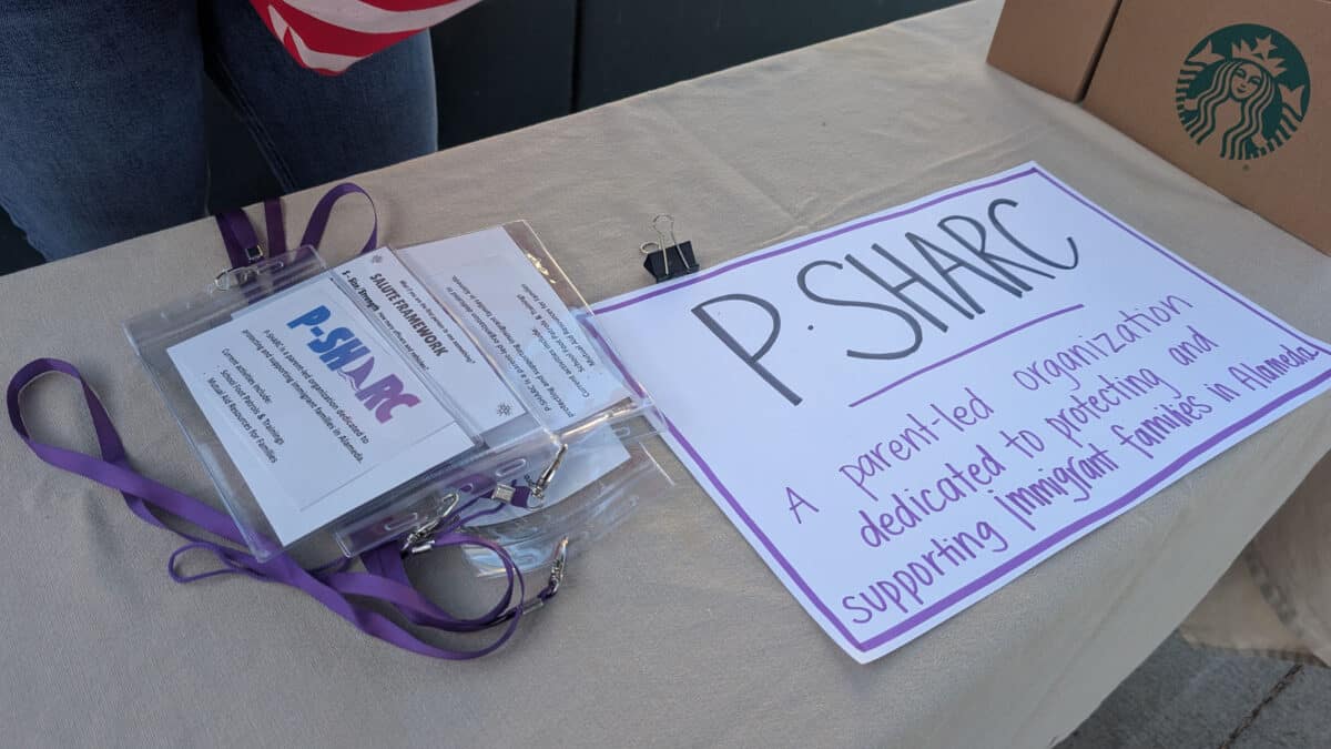 Alameda Post - P S.H.A.R.C. name tags are visible on a table.