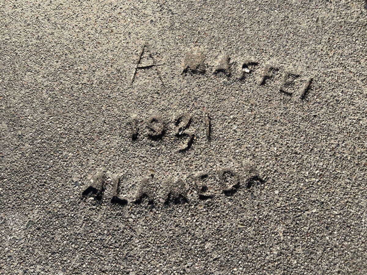 Alameda Post - A stamped sidewalk brand from 1931.