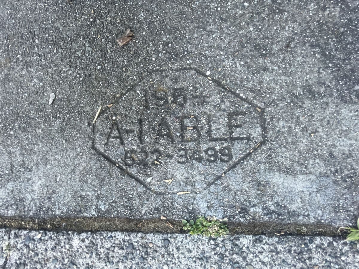 Alameda Post - A stamped sidewalk brand