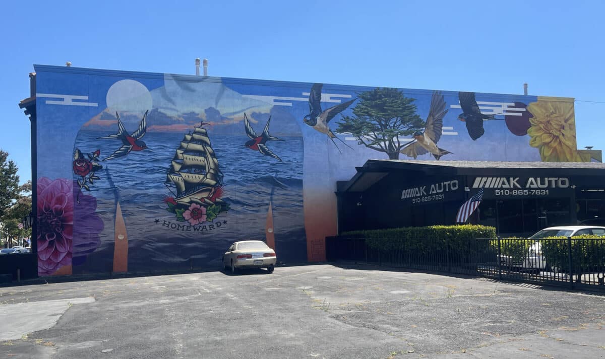 Alameda Post - A mural of sparrows and a ship with lots of sails. 