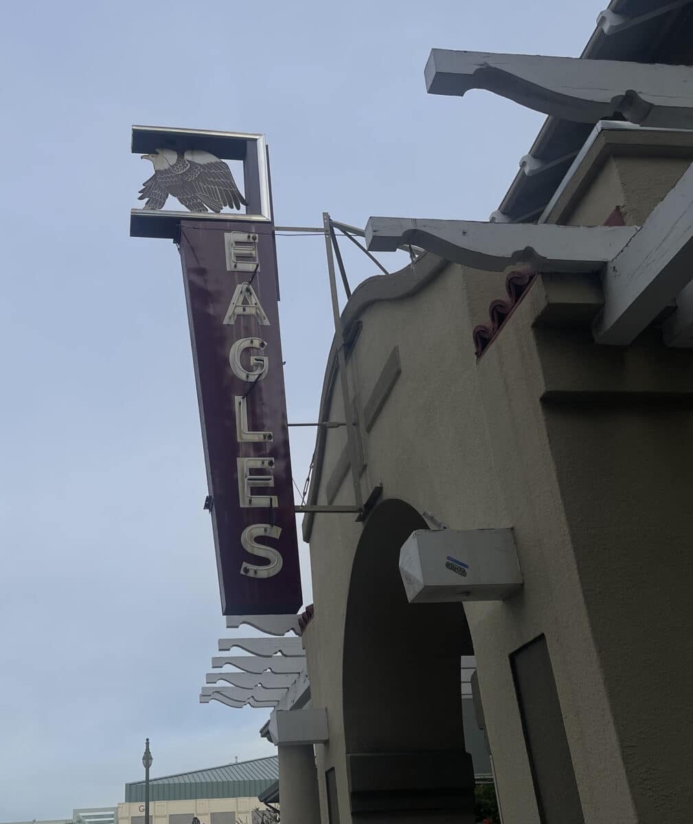 Alameda Post - An unlit sign during the daytime that says Eagles.