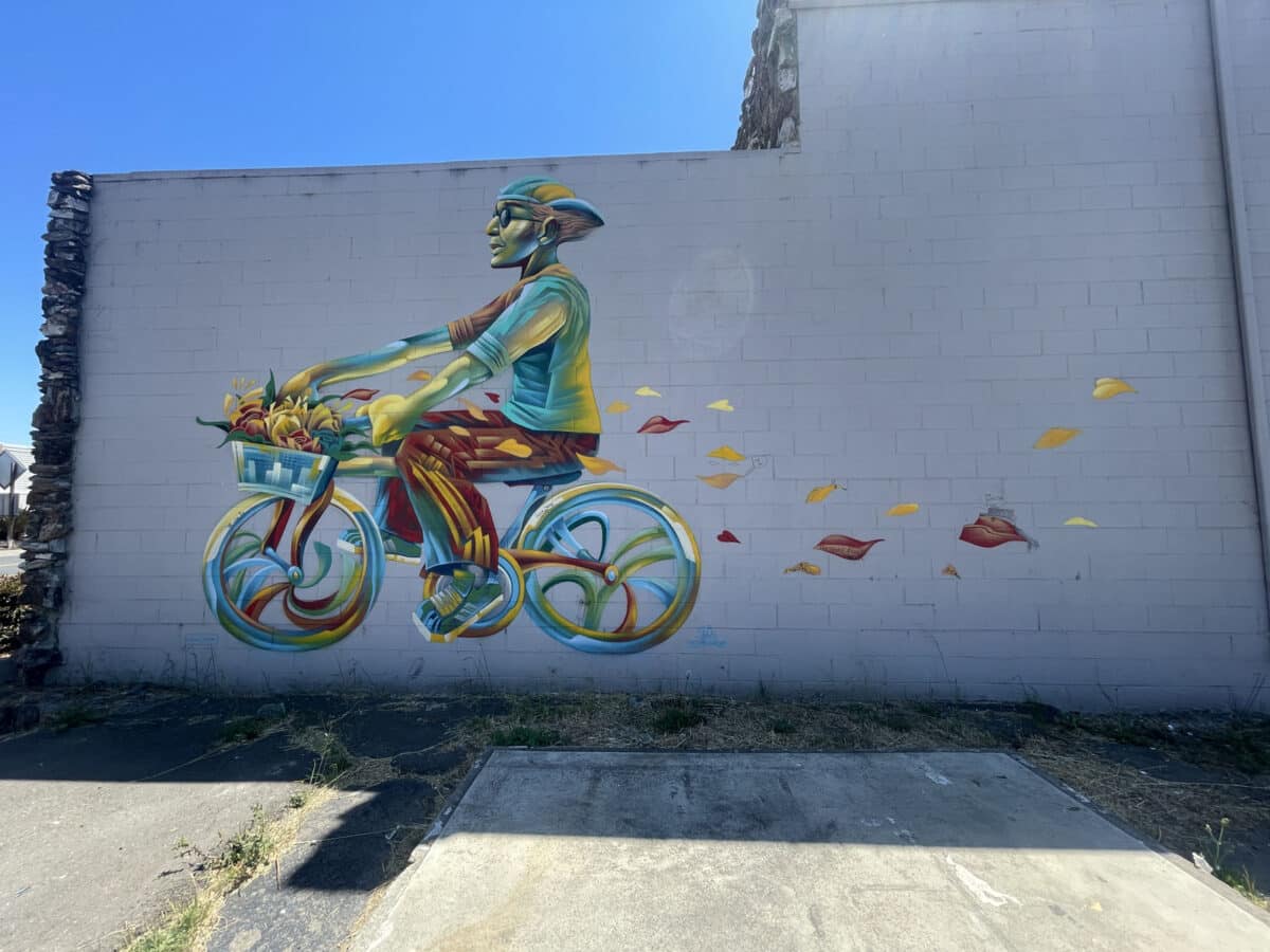 Alameda Post - A mural of a bicyclist. 