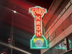 Alameda Post - A multicolored neon sign with a clock that says Fort Knox Alameda.