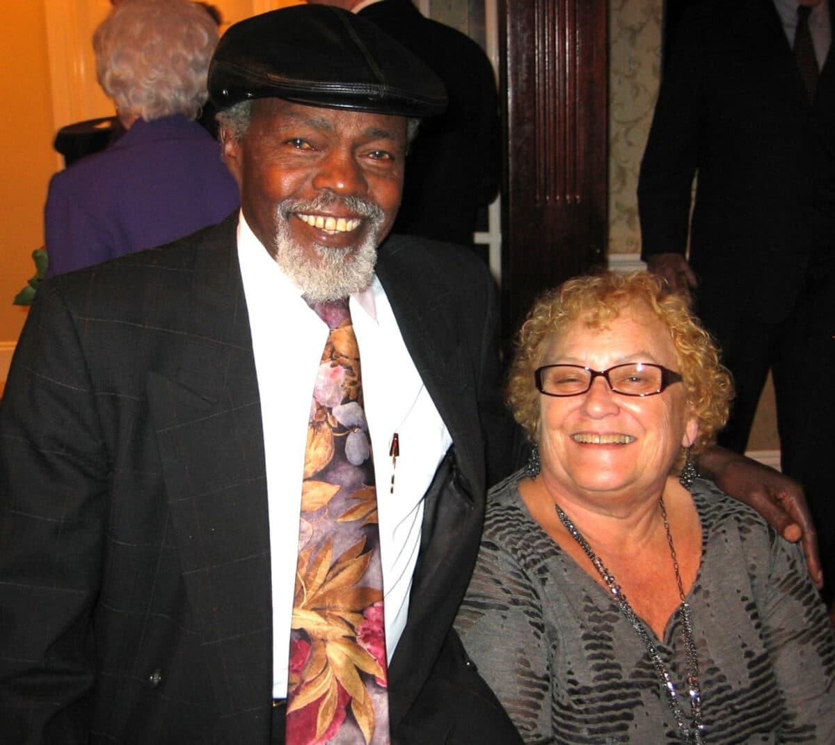Alameda Post - A man and woman smile at the camera.