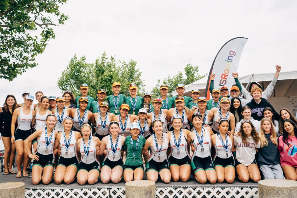 Alameda Post - A large group photo of a women's rowing team.