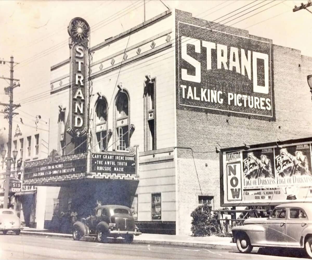 Alameda Post - A black and white photo of an old movie theater named "Strand Talking Pictures"