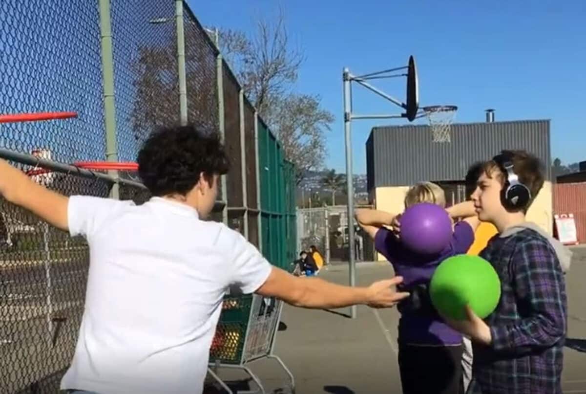 Alameda Post - Middle schoolers play outside with balls.