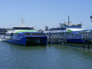 Alameda Post - Two S.F. Bay ferries at a dock.
