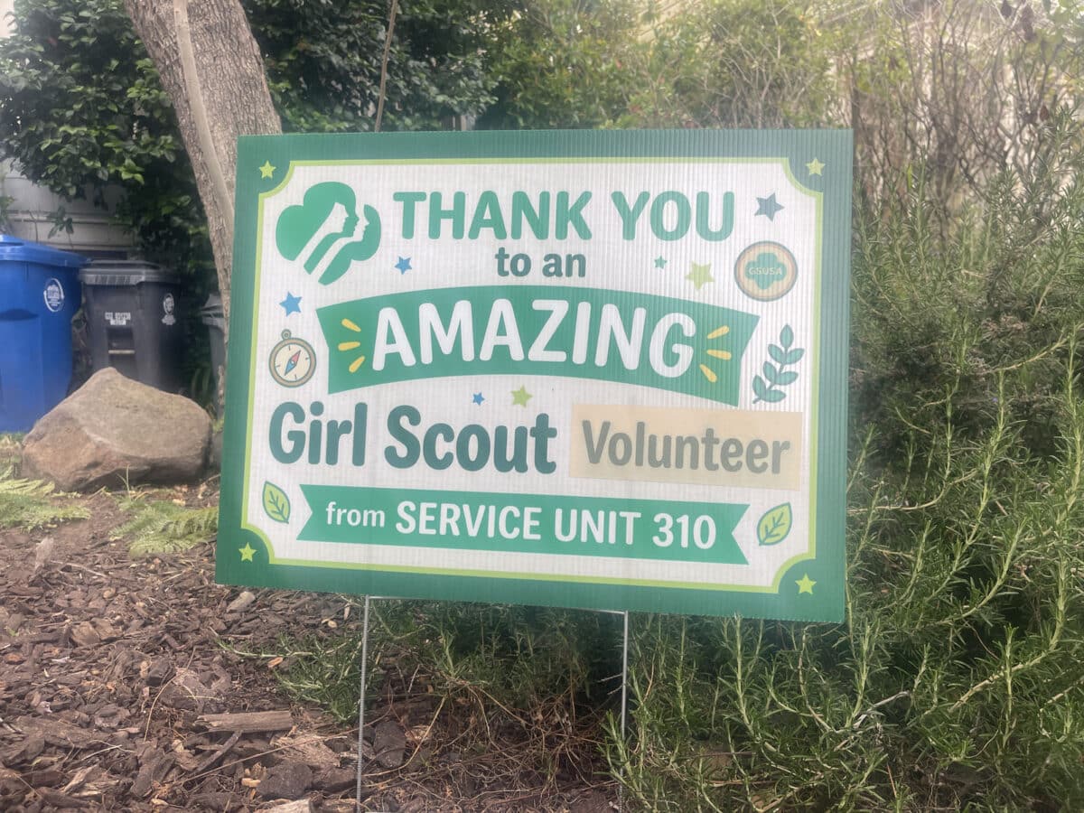 Alameda Post - A sign in a yard that says "Thank You to an amazing Girl Scout Volunteer from service unit 30." 