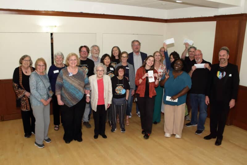 Alameda Post - A group of Kiwanis grant recipients stand together and smile.