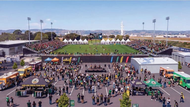 Alameda Post - A render of a soccer field and crowd attending match on Bay Farm Island.