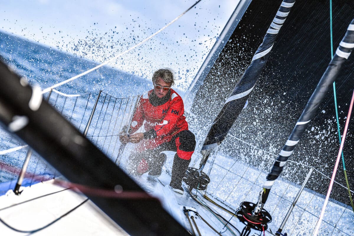 Alameda Post - An action photo of a woman sailing a boat in the open ocean.