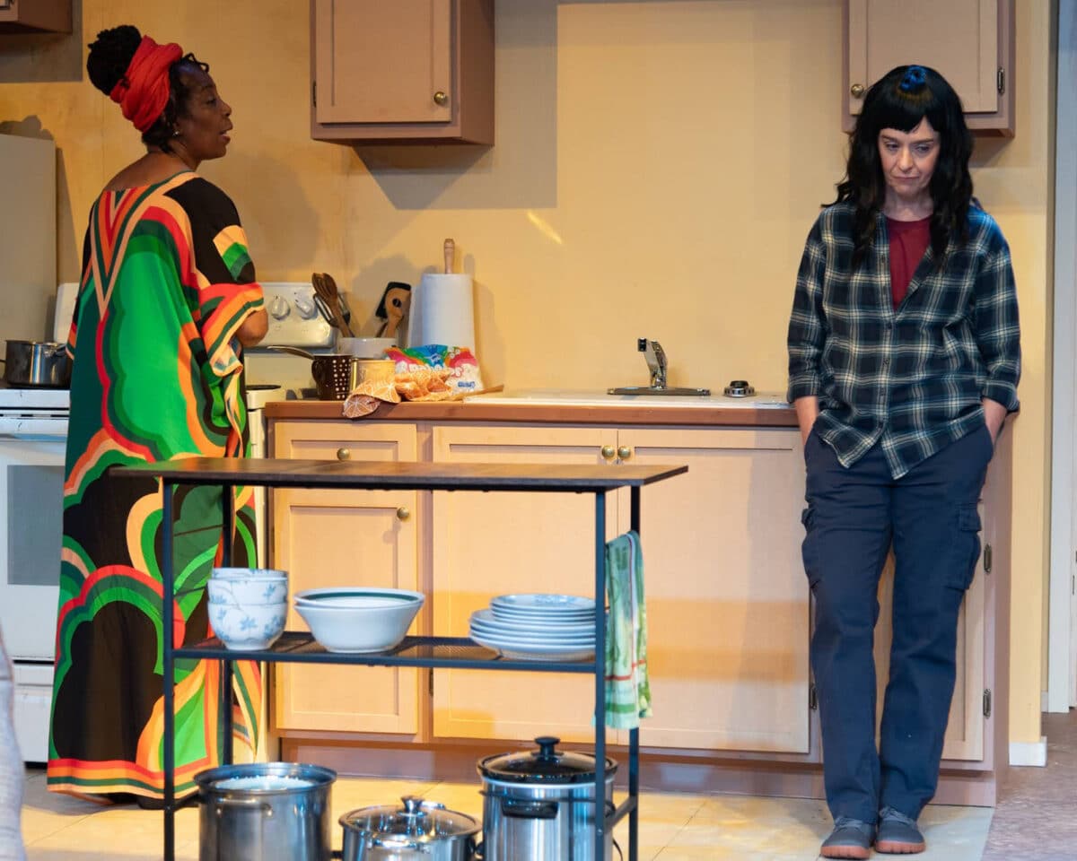 Alameda Post - A mother and daughter in 'night Mother stand onstage at a kitchen set.