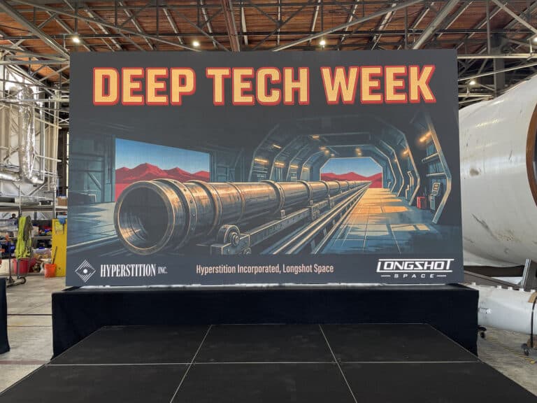 Alameda Post - A large poster for Deep Tech week in an industrial building.