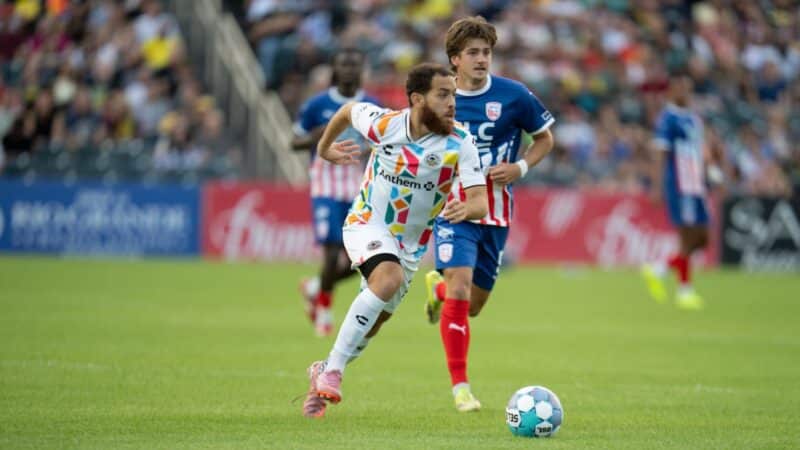Alameda Post - An Oakland Roots player runs for the ball against New Mexico United.