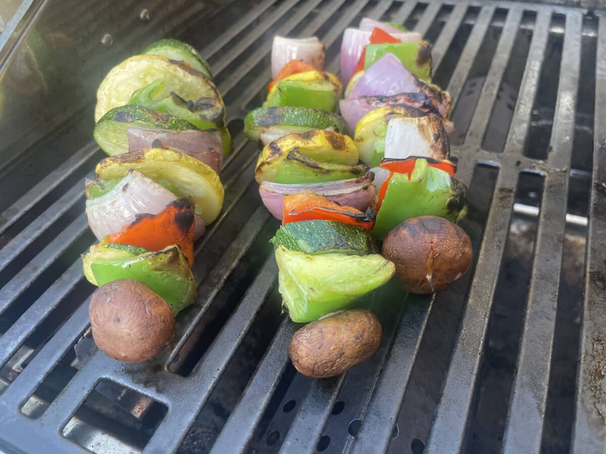 Alameda Post - Kebabs on a grill. 