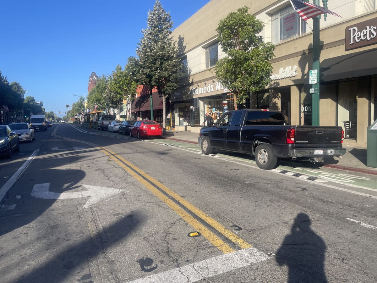Alameda Post - A vehicle parked in the bike lane on Park Street.