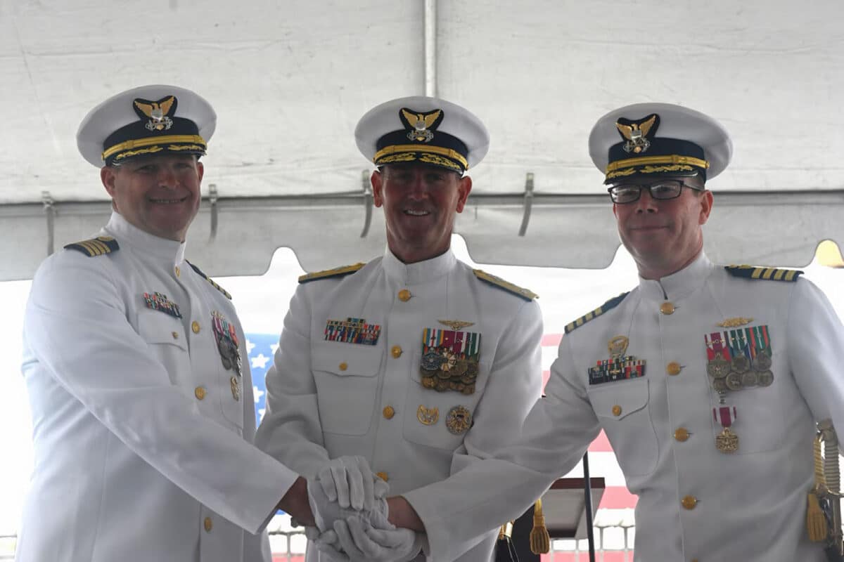 Alameda Post - Photos of three Coast Guard members dressed in white smiling and clasping hands.