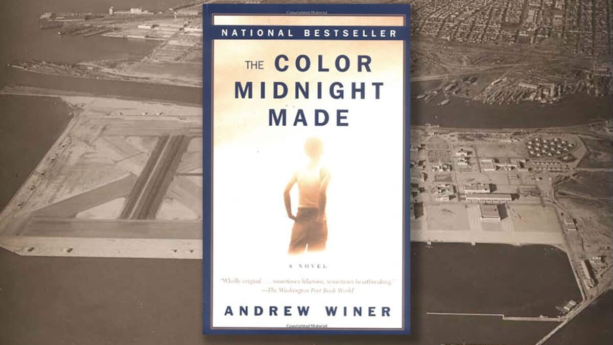 Alameda Post - Cover of "The Color Midnight Made" superimposed over a photo of the Alameda Naval Air Station.