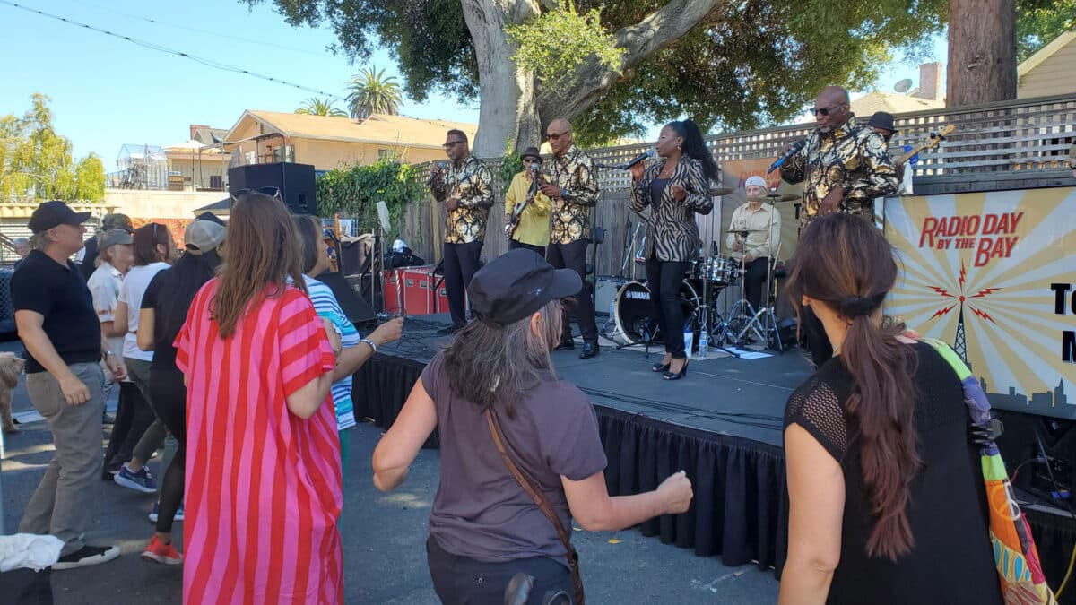 Alameda Post - Attendees dance at an outdoor concert at Radio Day by the Bay.