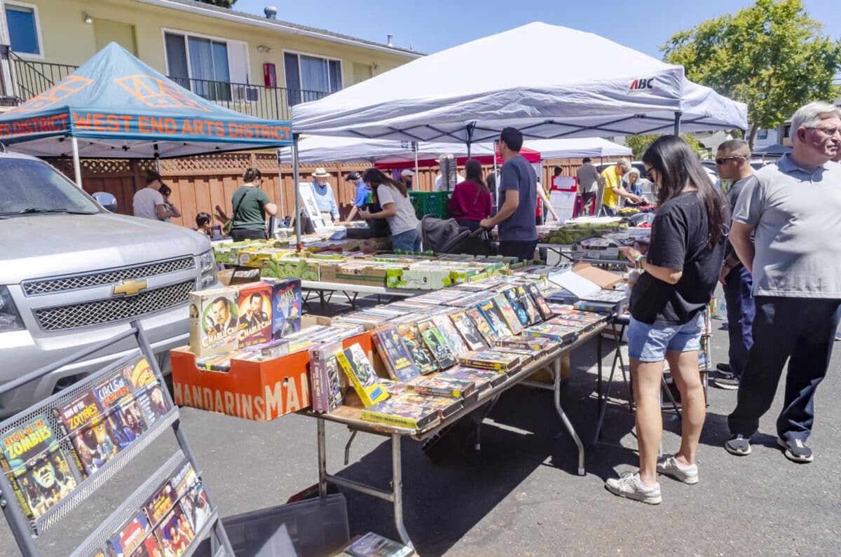 Alameda Post - Visitors browse merchandise at Radio Day by the Bay 2026.
