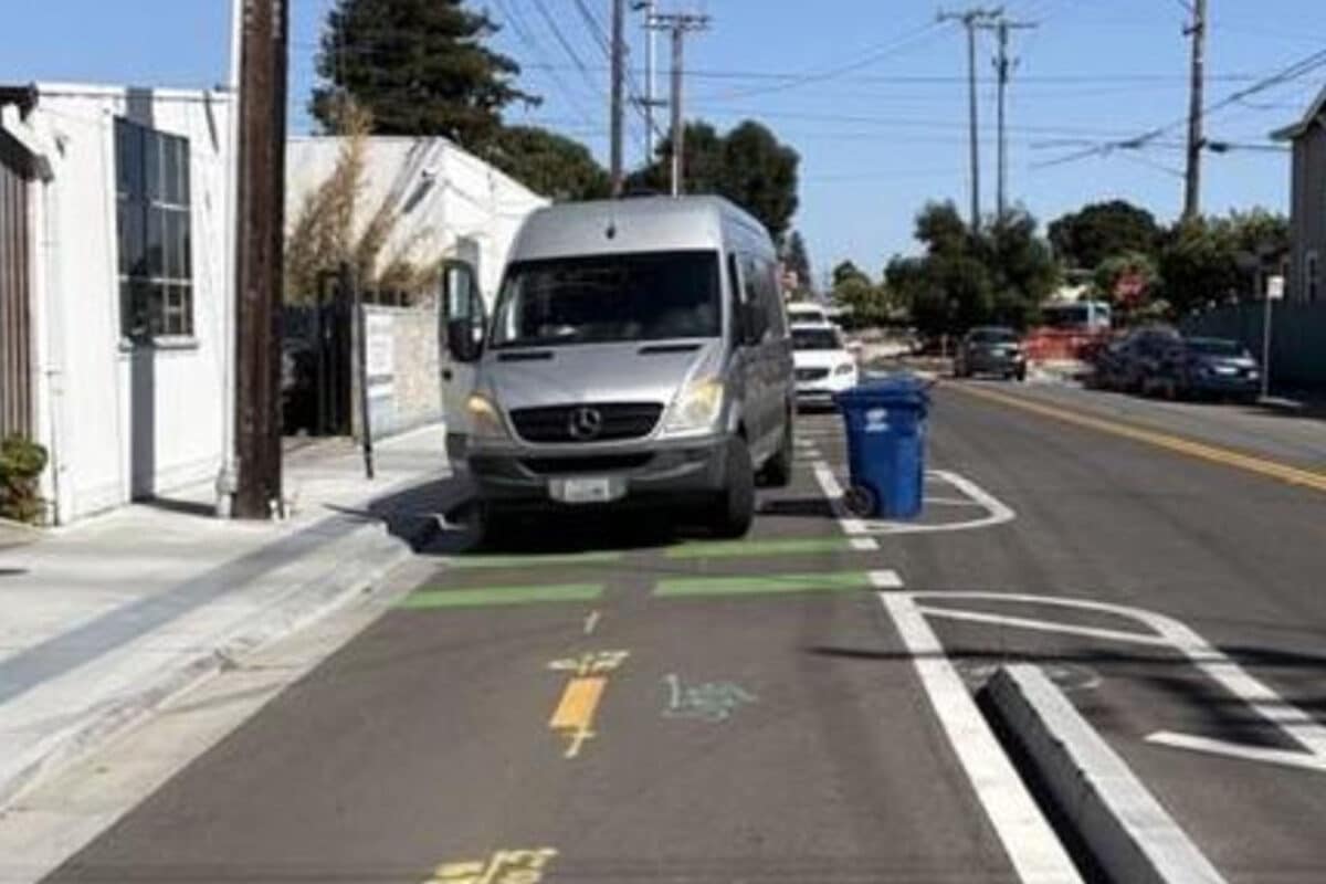 Alameda Post - A delivery van parked in a bike lane.