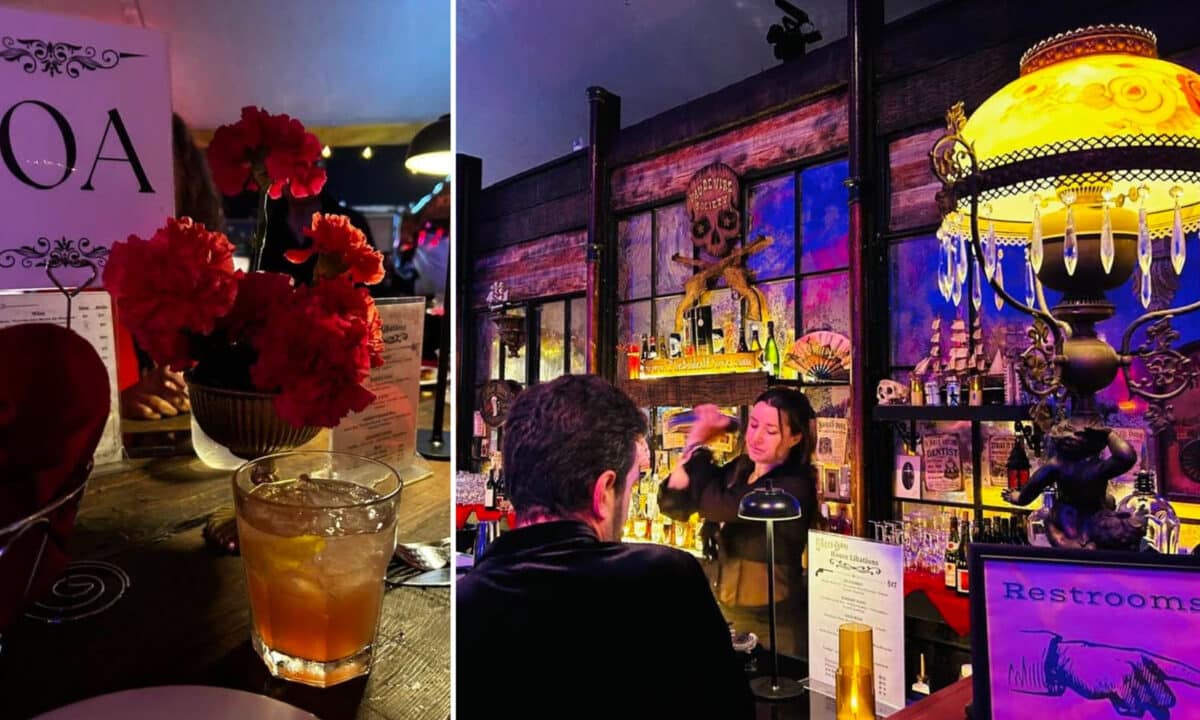 Alameda Post - A cocktail on a table, and a bartender making a drink behind the bar. 