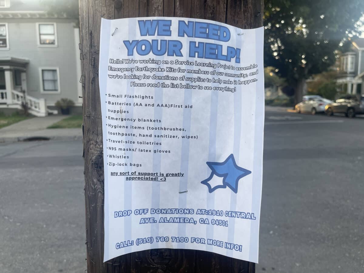 Alameda Post - A sign on a light post asking for supplies to make earthquake kits.