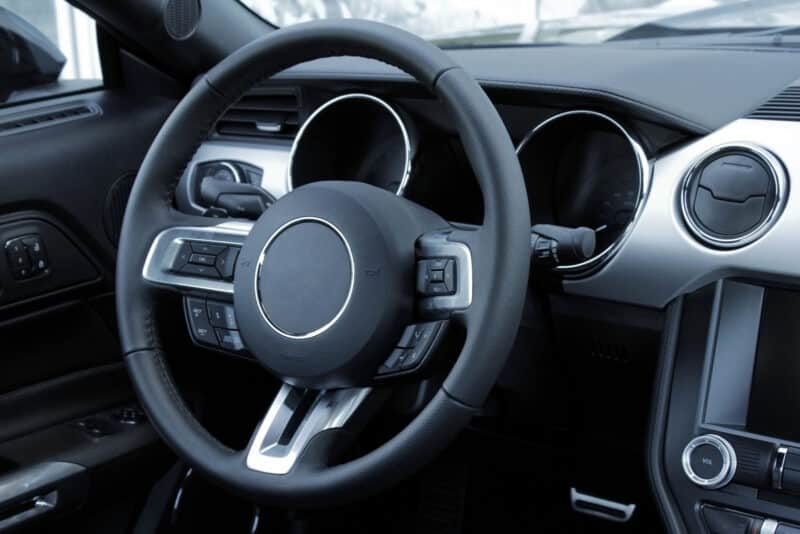 Alameda Post - A steering wheel in a car.