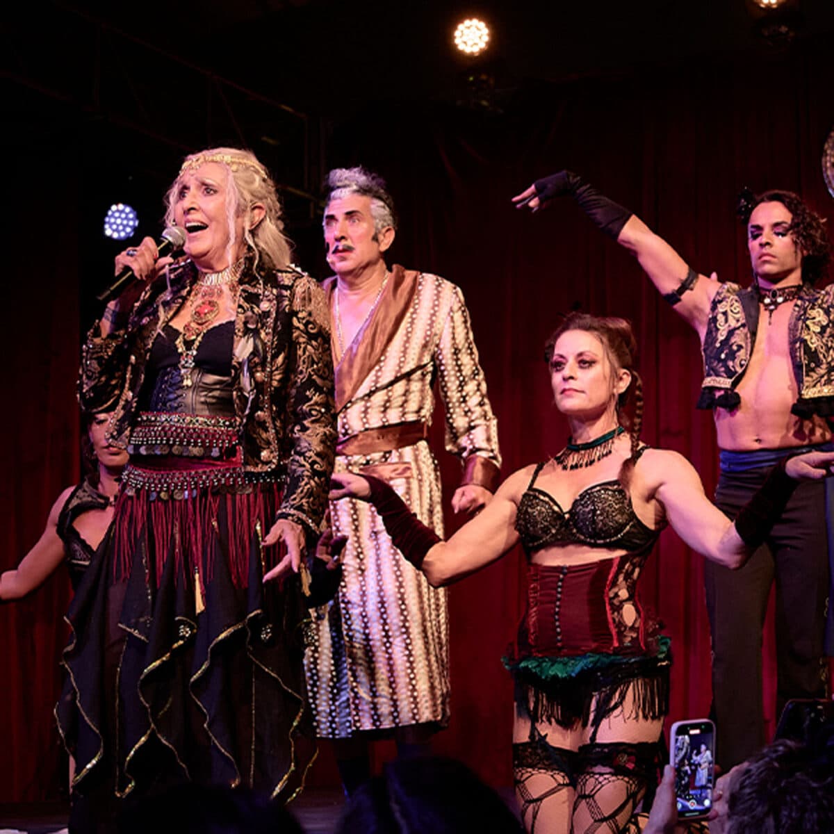Alameda Post - Joan Baez and Frank Ferrante perform with other performers in costume. 