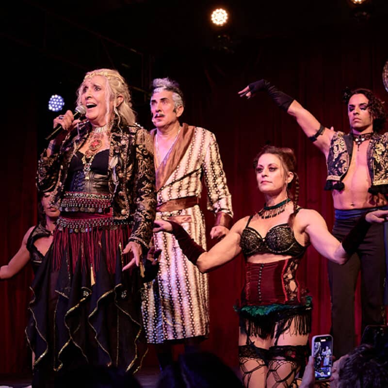 Alameda Post - Joan Baez and Frank Ferrante perform with other performers in costume.