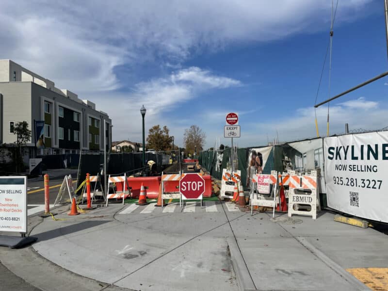 Alameda Post - Clement Avenue, between Grand Street and Hibbard Street, blocked off with lots of stop signs and deterrents so cars cannot drive on it.