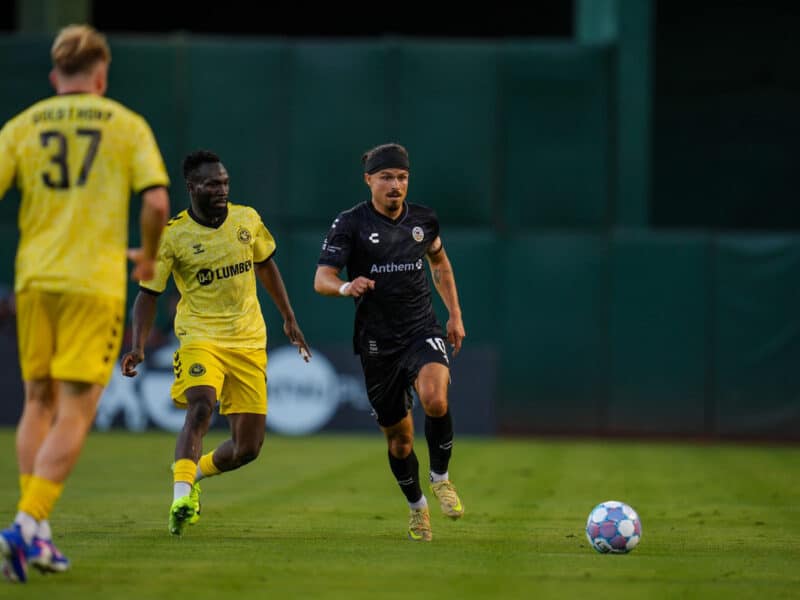 Alameda Post - A roots player goes for the ball in a match against the Pittsburgh Riverhounds.
