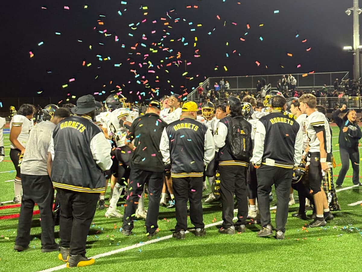 Alameda Post - high school football players celebrate a win