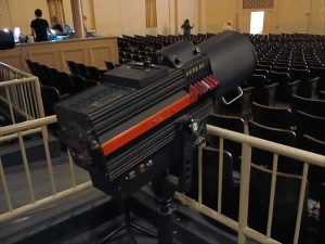 Alameda Post - A spotlight in an Auditorium.