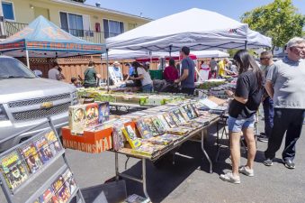 Alameda Post - Visitors browse merchandise at Radio Day by the Bay 2026.