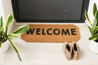 Alameda Post - a welcome mat in front of a home