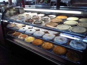 Alameda Post - a pie case full of pies