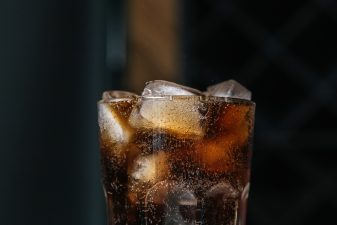 Alameda Post - an image of a cola in a glass with ice