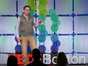 Alameda Post -Jonathan DeLong talks on a TedX Stage in Boston