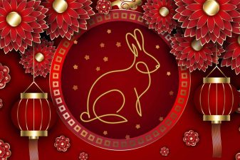 Alameda Post - a graphic for Lunar New Year with lanterns and a rabbit. The graphic is deep red and gold