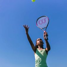 Alameda Post - young girl playing tennis. Encinal High School needs a Women's Tennis Coach